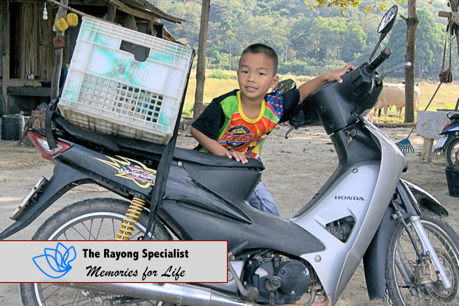 Motor cycle and a boy in Rayong